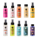 Collection of various spray bottles with different colored labels on a white background